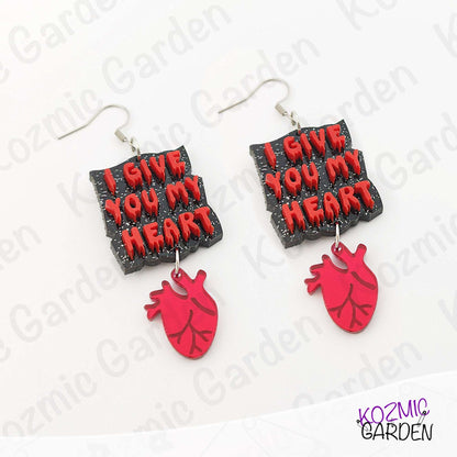 Earrings with 'I Give You My Heart' text and red heart design on a white background.