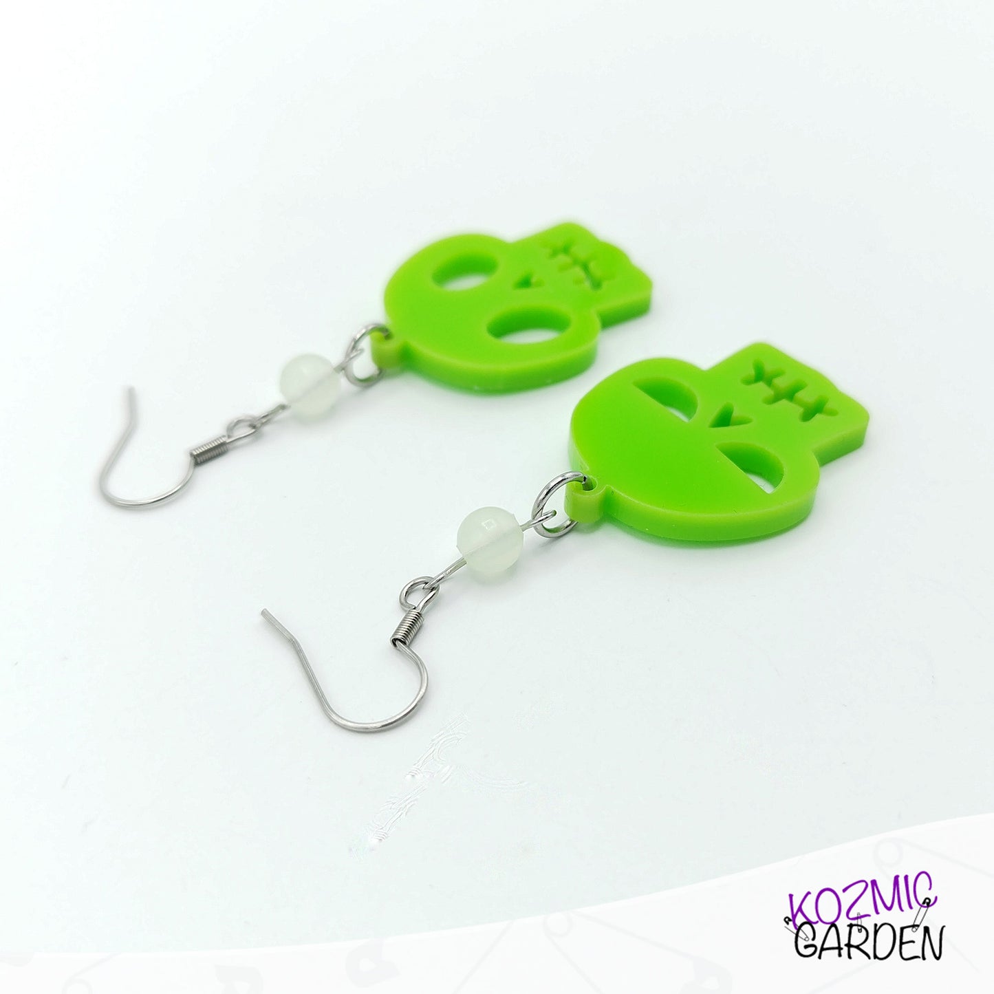 Mismatched Green Skull Earrings – Happy and Angry Green Fellas