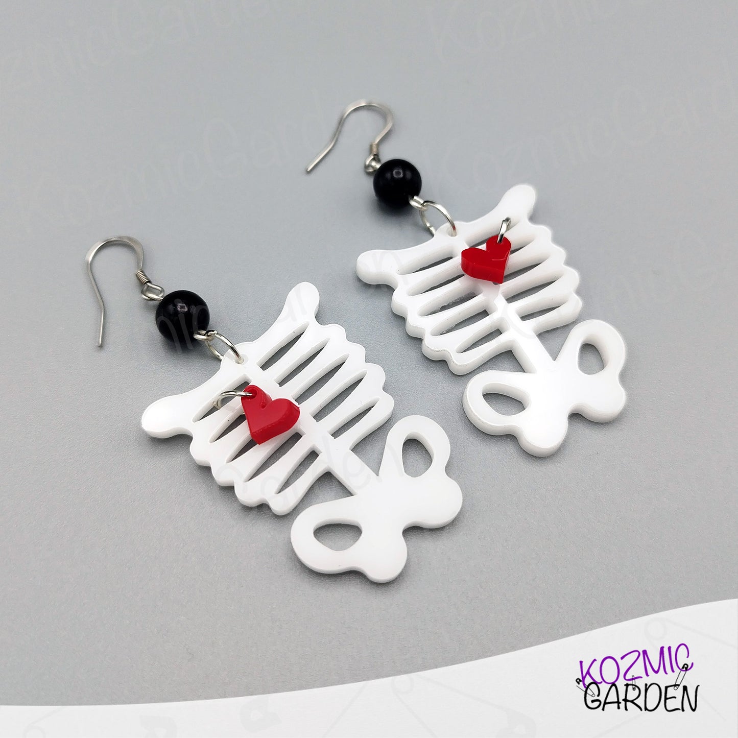 Rib Cage Earrings with Dangling Red Heart – Love Me to the Bone!