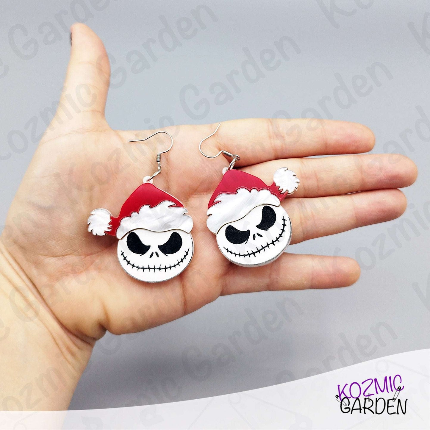 Jack Santa earrings styled with holiday décor. Perfect mashup of Nightmare-style Halloween and merry Christmas fun.
