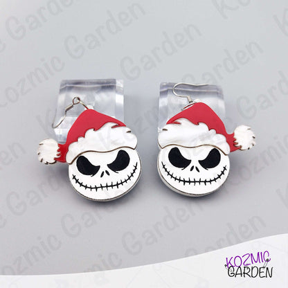 Close look at the black and white Jack Skellington face with a red Santa hat. Lightweight acrylic earrings with crisp engraved details and a glossy finish.